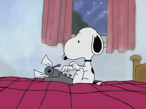 gif of snoopy writing on a typewriter